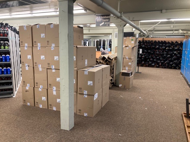 boxes of new skis and boots